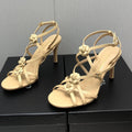 CHANEL FLORAL HIGH HEEL SANDAL IN SAND YELLOW LAMBSKIN
